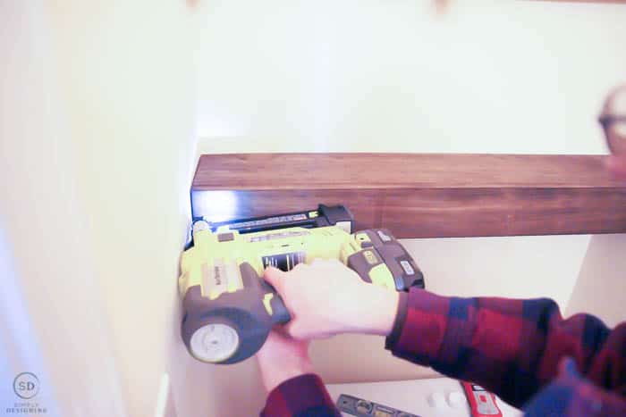 use nail gun to attach front to floating shelves