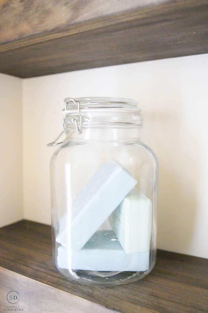 bathroom decorations on floating shelves