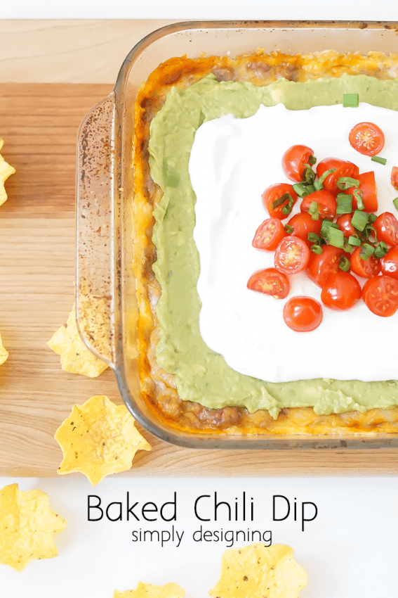 Baked Chili Dip - this is an amazing baked 7 layer dip!  Perfect to bring to a party!