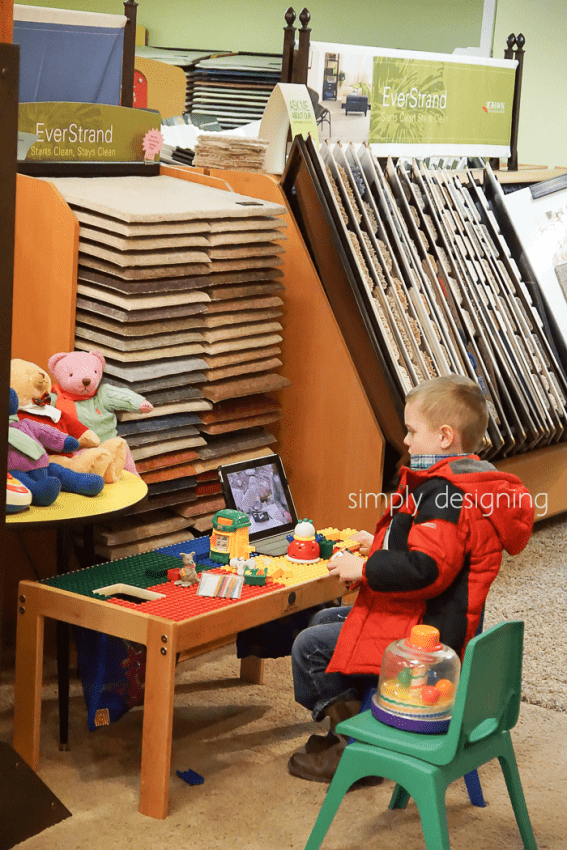 Son playing in the Kids Corner in a new carpet store