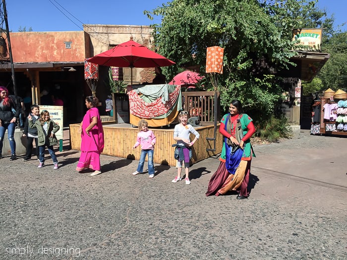 Dancing with performers in the Asia section of Animal Kingdom