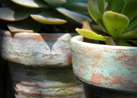 dirt painted clay pots