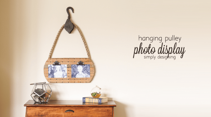 hanging pulley photo display this fun pallet board makes a great way to display photos and I love this vintage pulley Hanging Pulley Photo Display 12 craft room