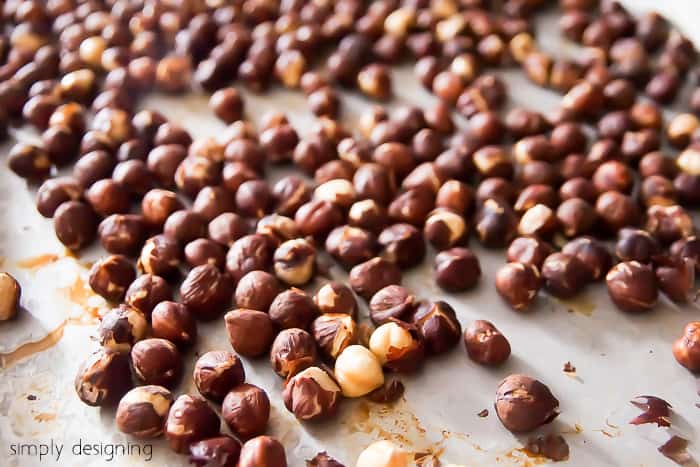 Roast Hazelnuts for Nutella Recipes - How to make homemade Nutella. This is so much better than store bought and I love that I can control my ingredients and customize it to my families preferences.