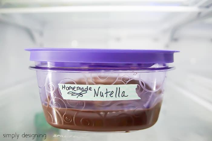 Homemade Nutella in a Rubbermaid container stored in the refrigerator