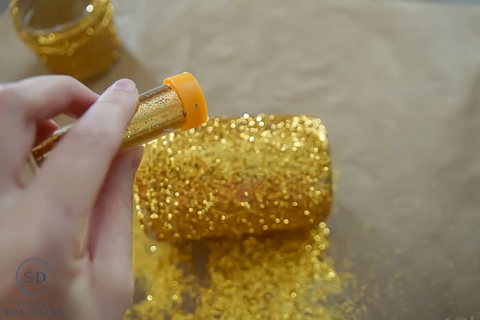 DIY Gold Glitter Mason Jar Luminaries - add glitter