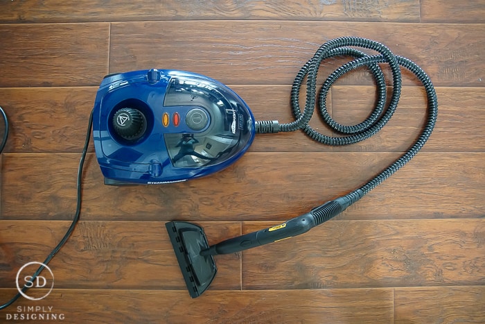 Homeright Steam Machine sitting on a hardwood floor