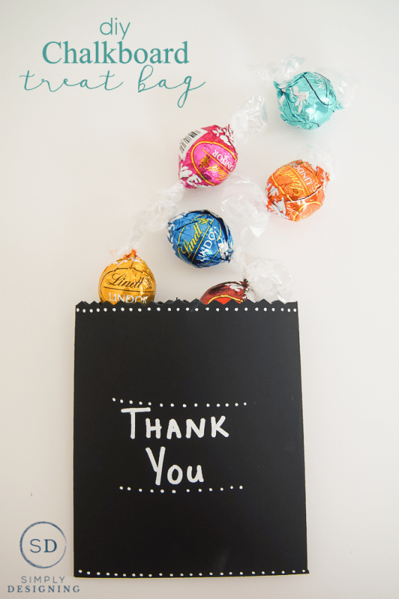 Making your own DIY Chalkboard Treat Bag is a fun way to create your own custom treat bag. And you can write and re-write a note on it because it is made with chalkboard paper.