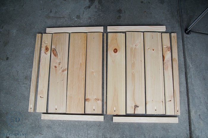 Layout of all wood pieces for DIY Baby Gate with Pocket Holes created with a Kreg Jig