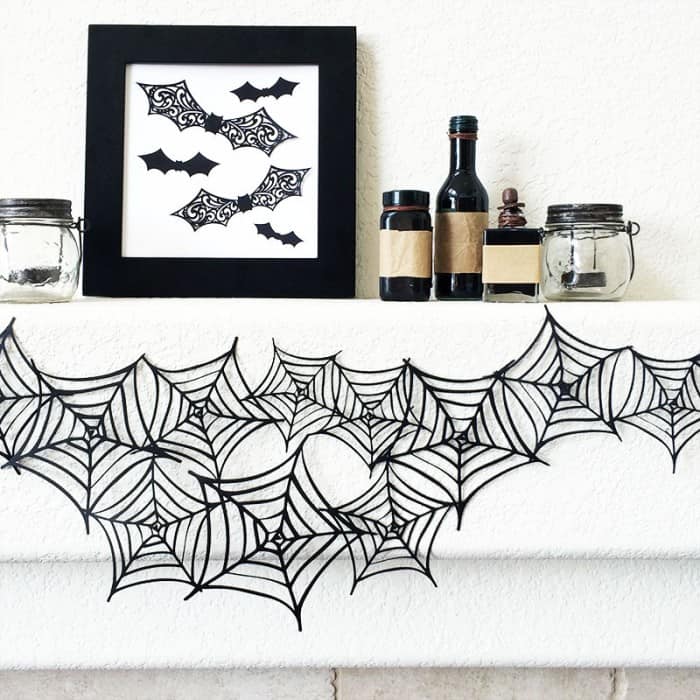 Cut Paper Spider Web Garland by Jen Goode of 100 Directions