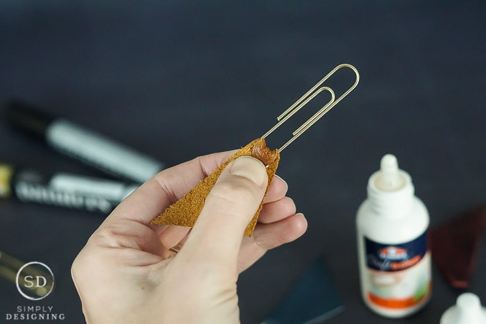 Modern Leather Bookmark - hold leather together to bond and let glue set