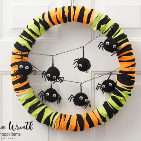 Such a fun and easy Halloween Wreath made only from items found at the dollar spot