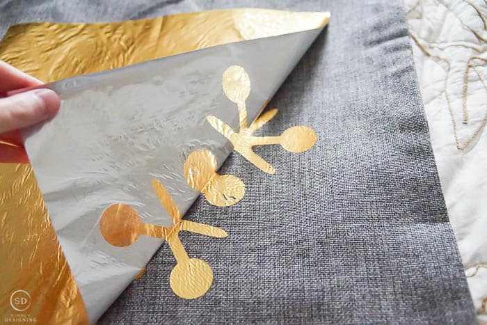 remove excess gold foil from fabric