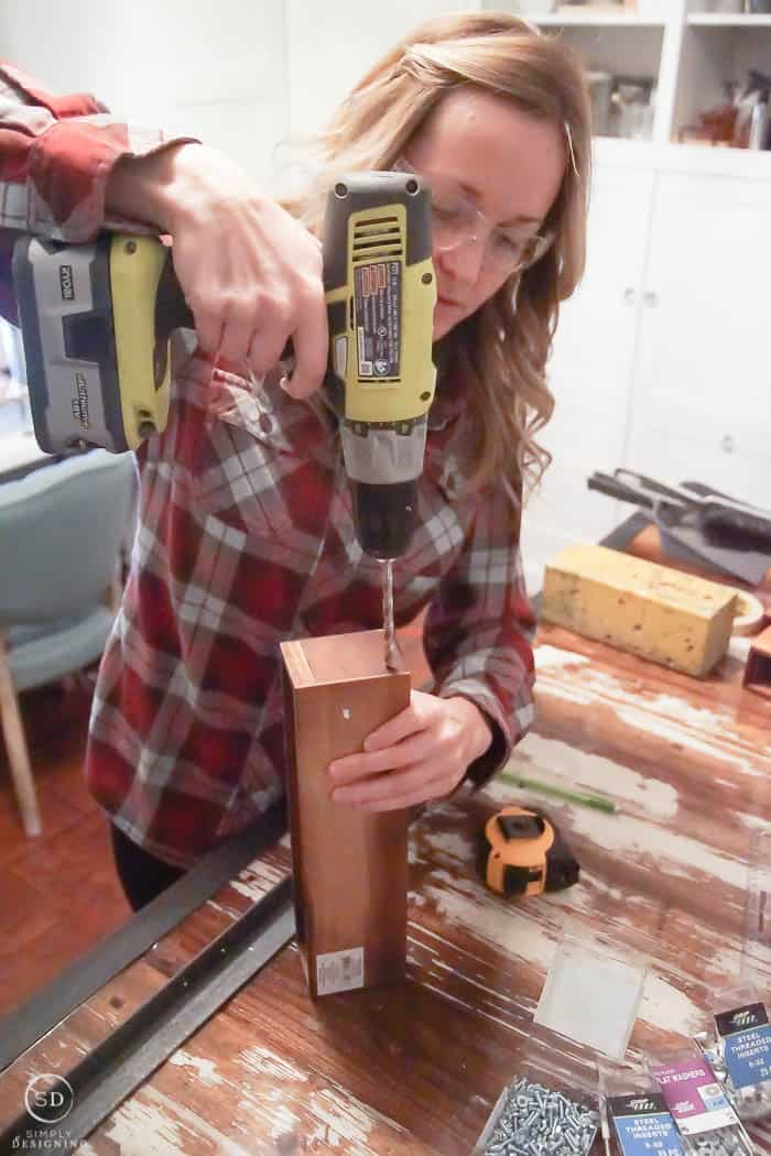 Drill holes into spice rack