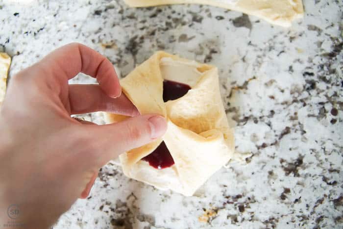 pinch corners of crescent roll together