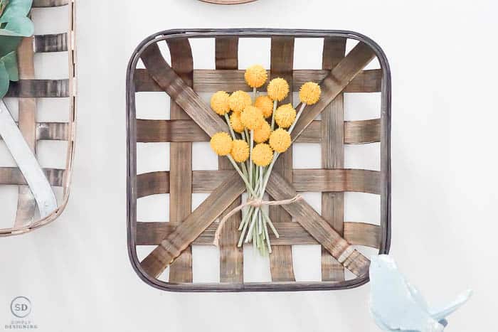 yellow flowers on tobacco basket