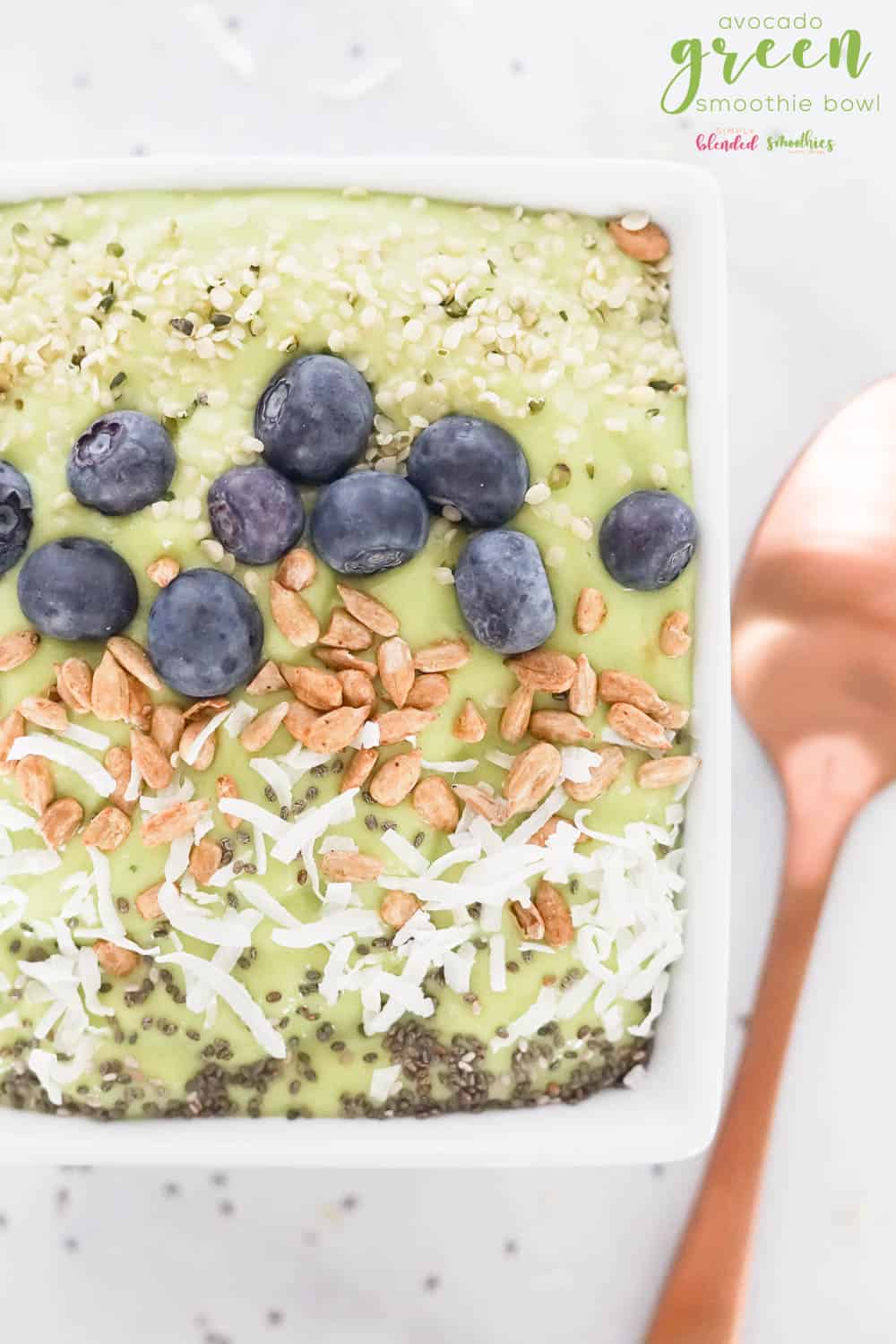 Avocado Green Smoothie Bowl 5 Avocado Green Smoothie Bowl - creamy green smoothie bowl topped with blueberries sunflower seeds chia seeds coconut flakes and hemp seeds