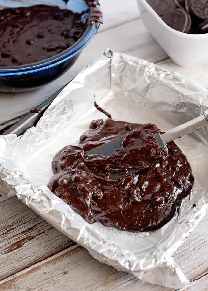 spread brownie batter in pan