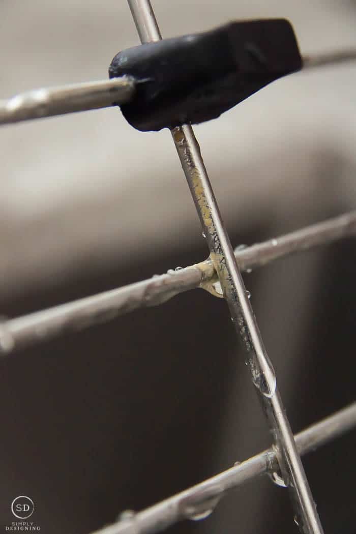 kitchen sink grid before cleaning with steam machine