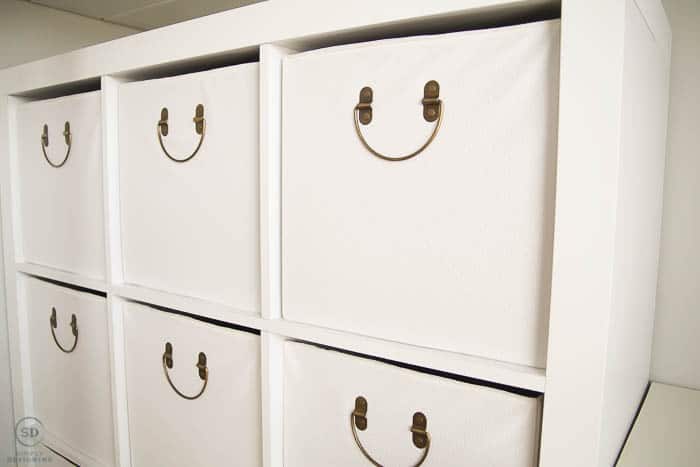 bins on bookcase