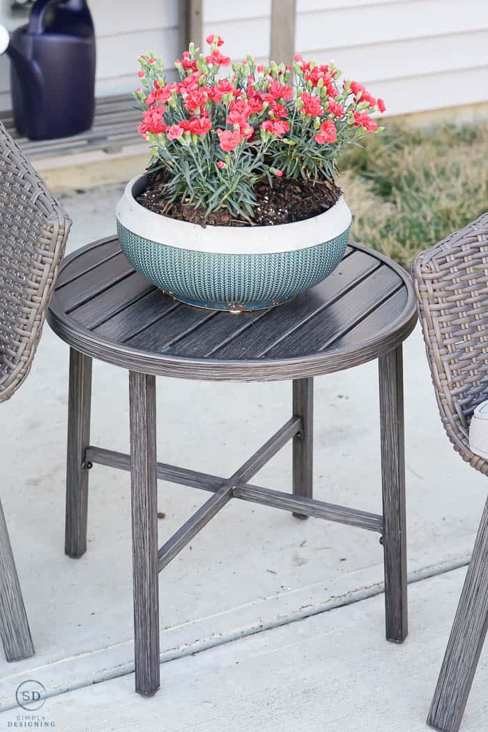 side table and flowers - outside living - patio makeover - how to pot a plant