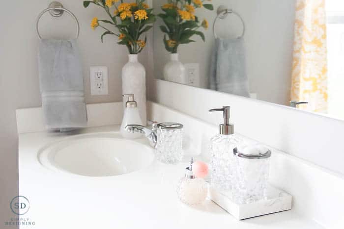 close up of counter decorated in an affordable master bathroom makeover