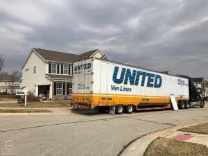 We Moved moving truck in front of house We Moved! 1 We moved