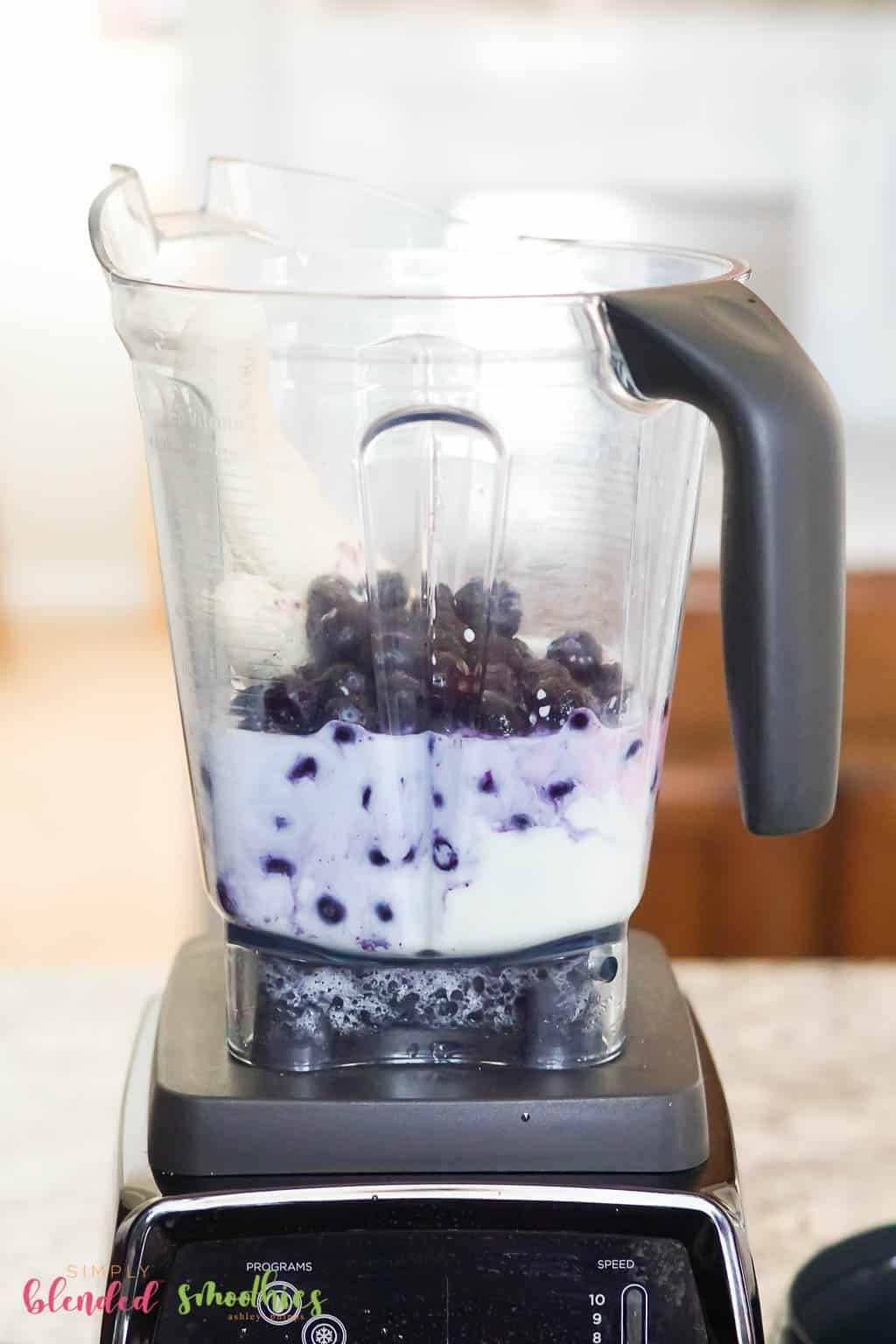 Blueberry Banana Smoothie 7 Blueberry Banana Smoothie ingredients in blender ready to make a smoothie