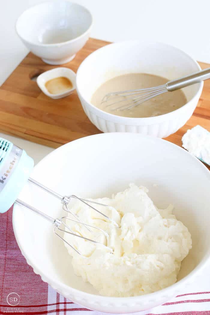 Cream whipped till fluffy for homemade vanilla ice cream.