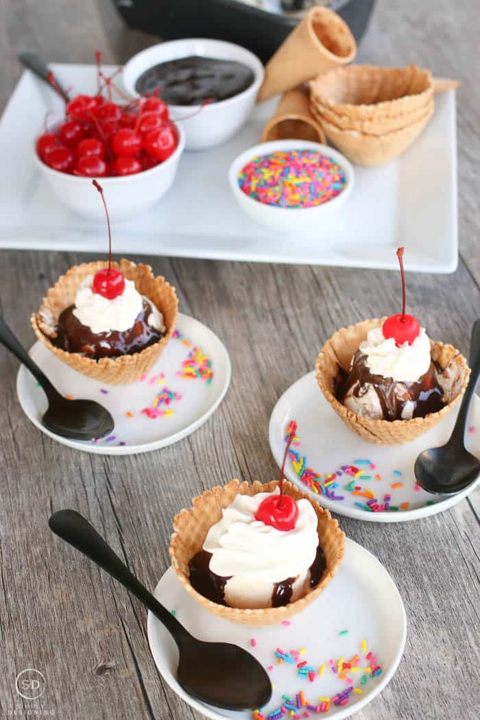Homemade ice cream sundaes with toppings.