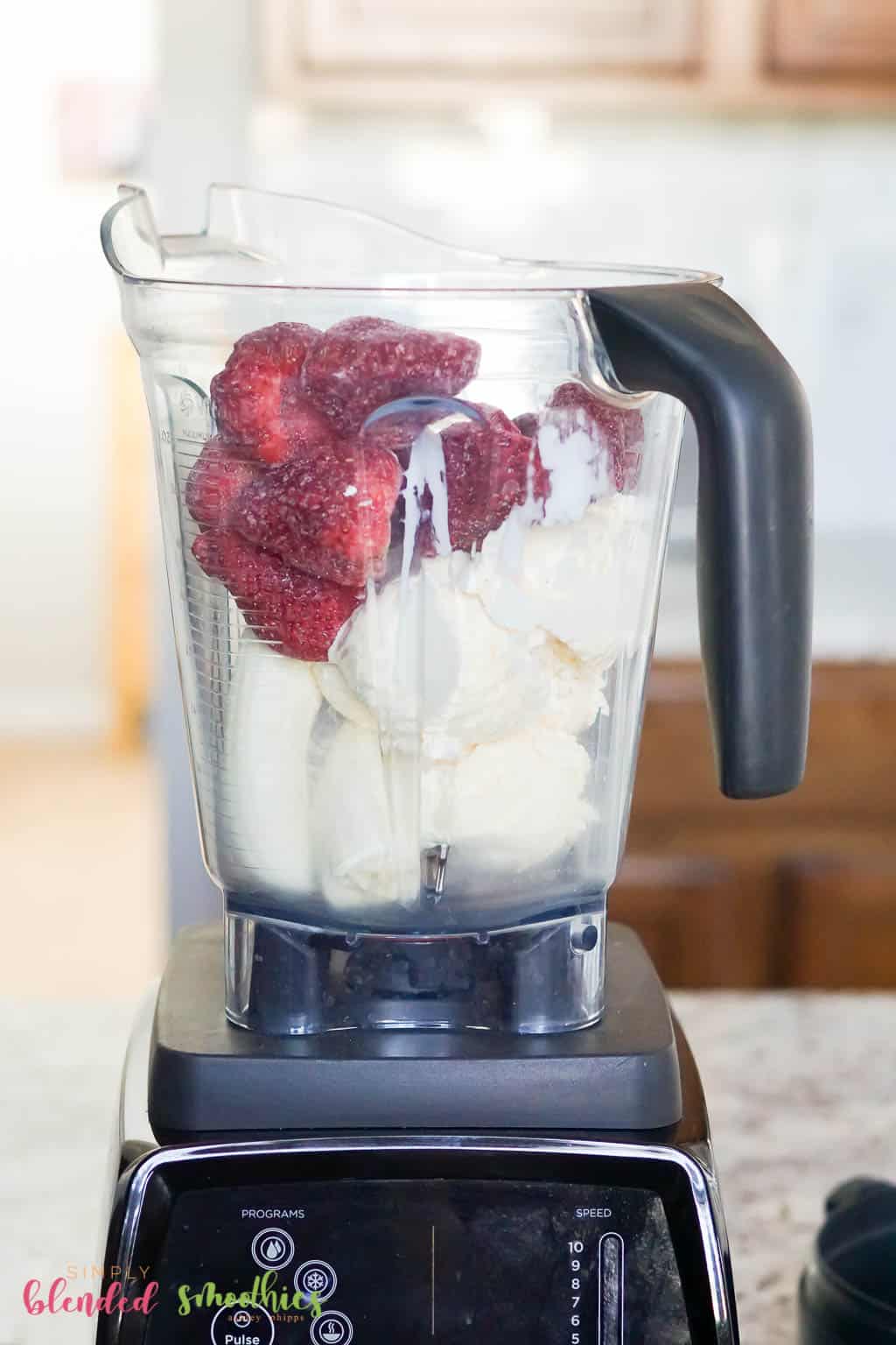 Strawberry Banana Milkshake 4 strawberry banana milkshake ingredients in blender