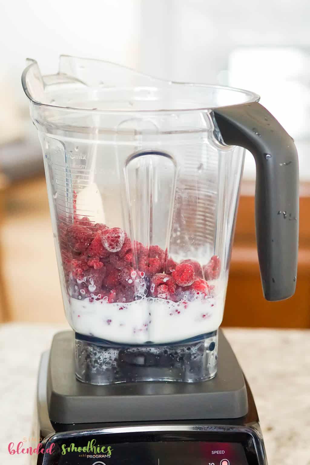 Raspberry Smoothie 6 raspberry smoothie ingredients in blender