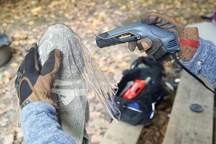 use a heat gun to heat up plastic and mold it into a ghost shape