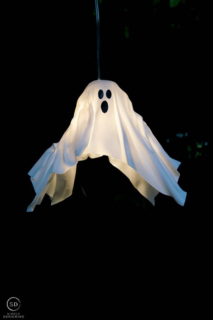 DIY Hanging Ghost Lantern turned on and hanging up
