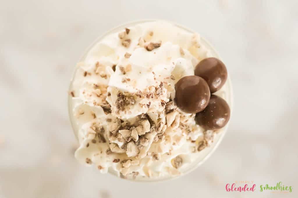 Malted Milkshake 4 looking at the top of a vanilla malted shake with malt balls on top