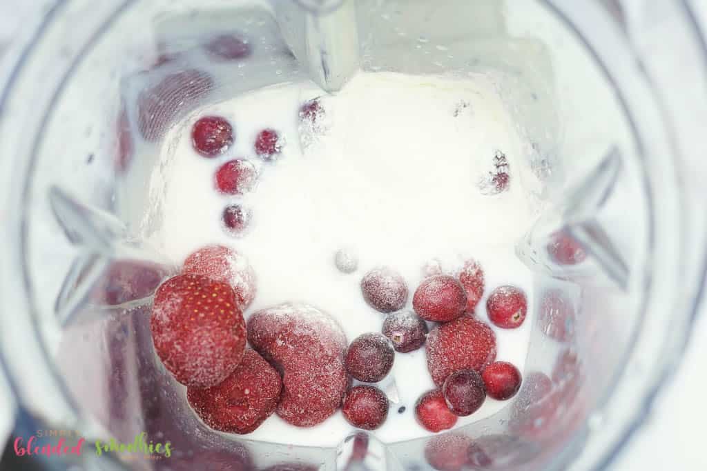 Cranberry Truffle Smoothie 10 looking down at ingredients for smoothie in a blender