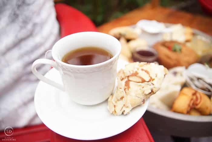 tea cup with peppermint tea and scone