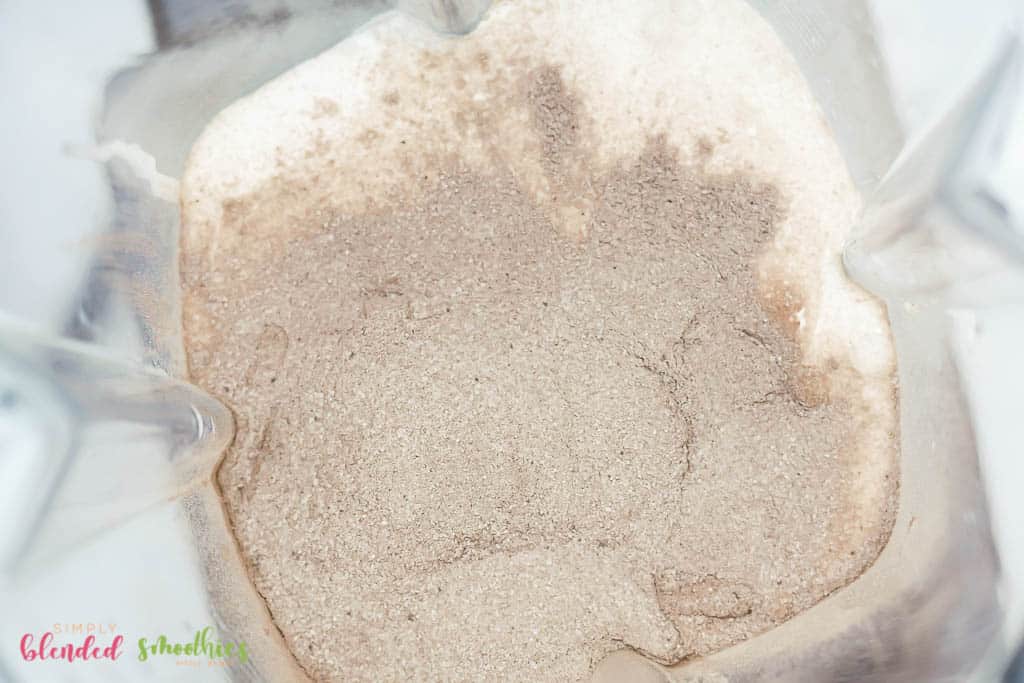 Easy Frozen Hot Chocolate Recipe 9 cream and hot cocoa powder in blender looking from the top down