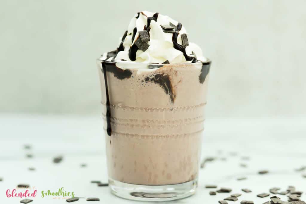 Easy Frozen Hot Chocolate Recipe 5 Easy Frozen Hot Chocolate in a glass cup with whipped cream and chocolate syrup