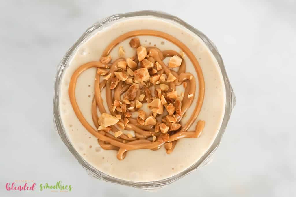 Peanut Butter Banana Smoothie with peanut butter swirl and chopped peanuts