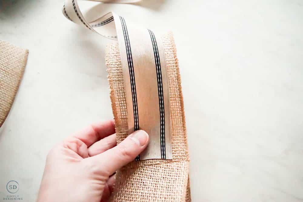 add second fabric to burlap for bow made with two ribbons