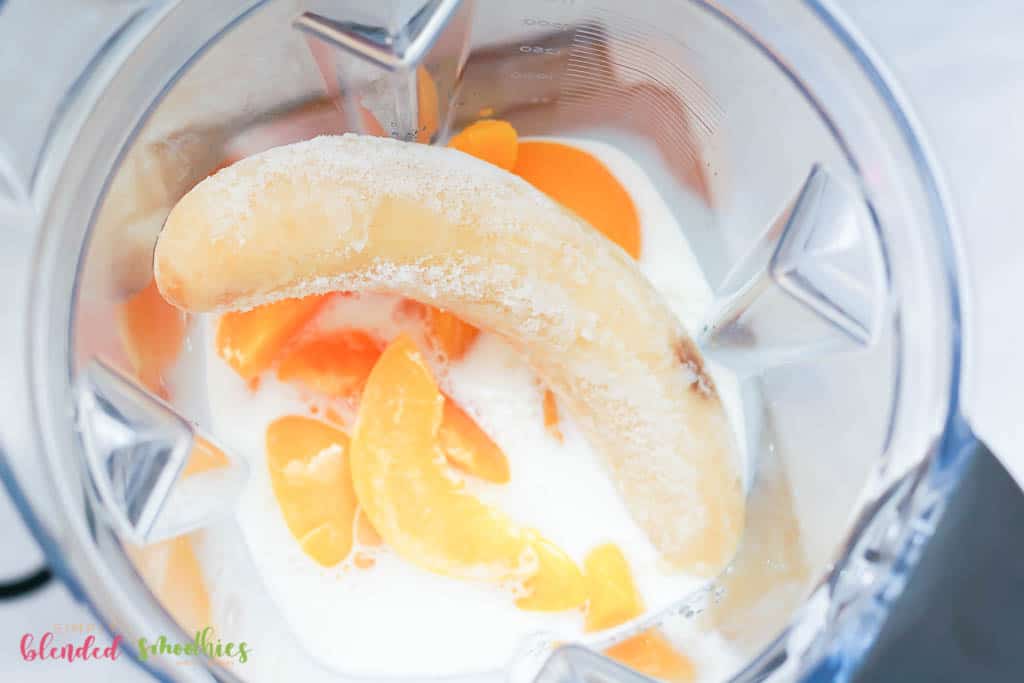 Banana Peach Smoothie 10 smoothie ingredients in a blender photo from the top into the blender