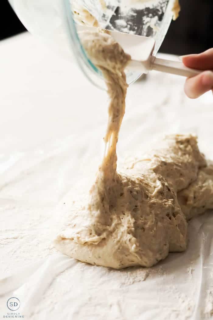 pour dough onto floured surface