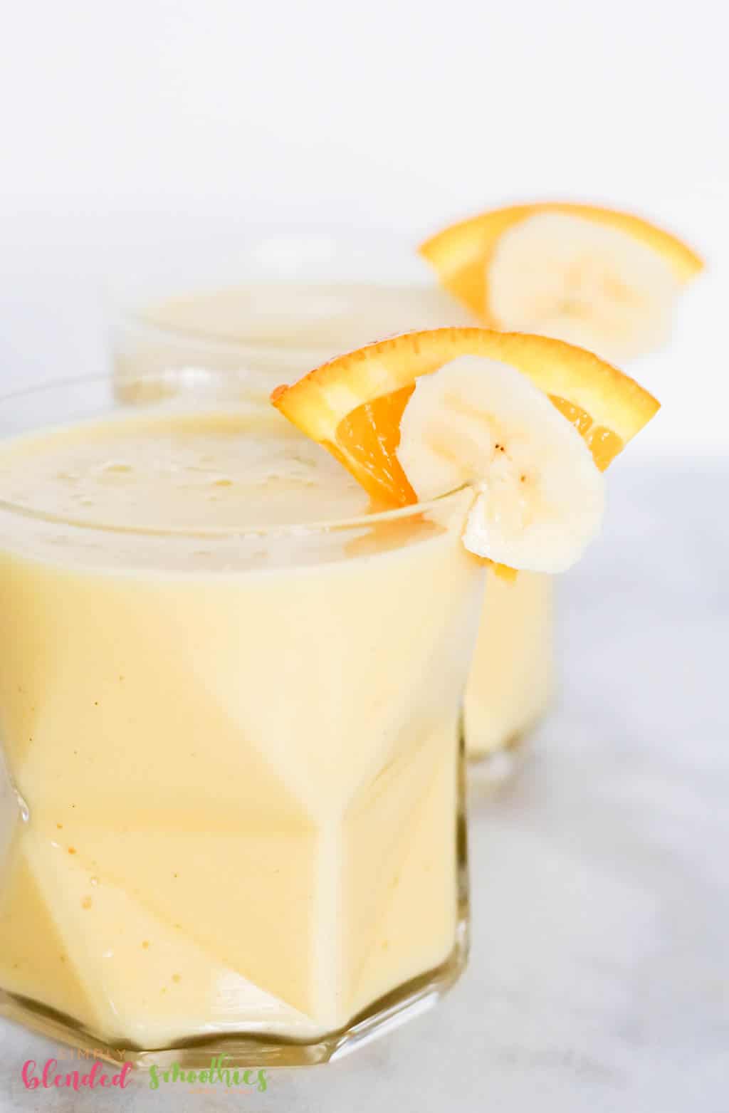 Banana Peach Smoothie 15 Orange Banana Smoothie Recipe with oranges and bananas as garnish