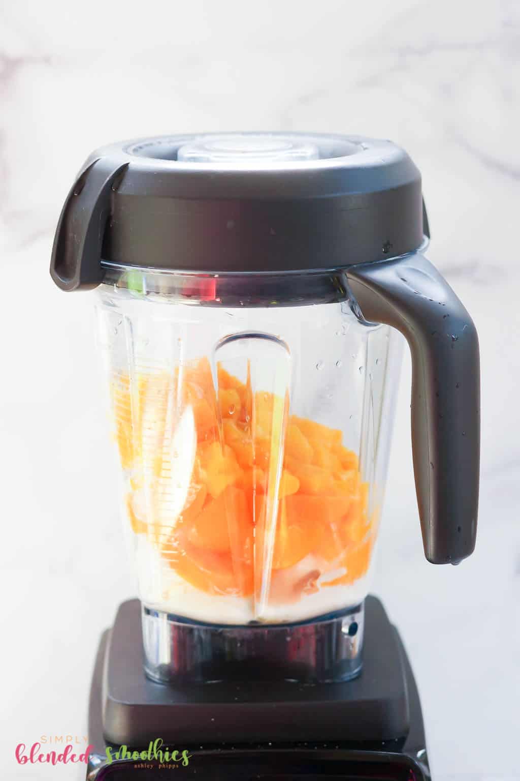 Mango Peach Milkshake 11 ice cream mangos and peaches in a blender