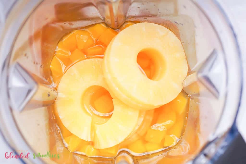 3 Ingredient Mango Pineapple Smoothie 8 mango and pineapples in a blender looking from the top down