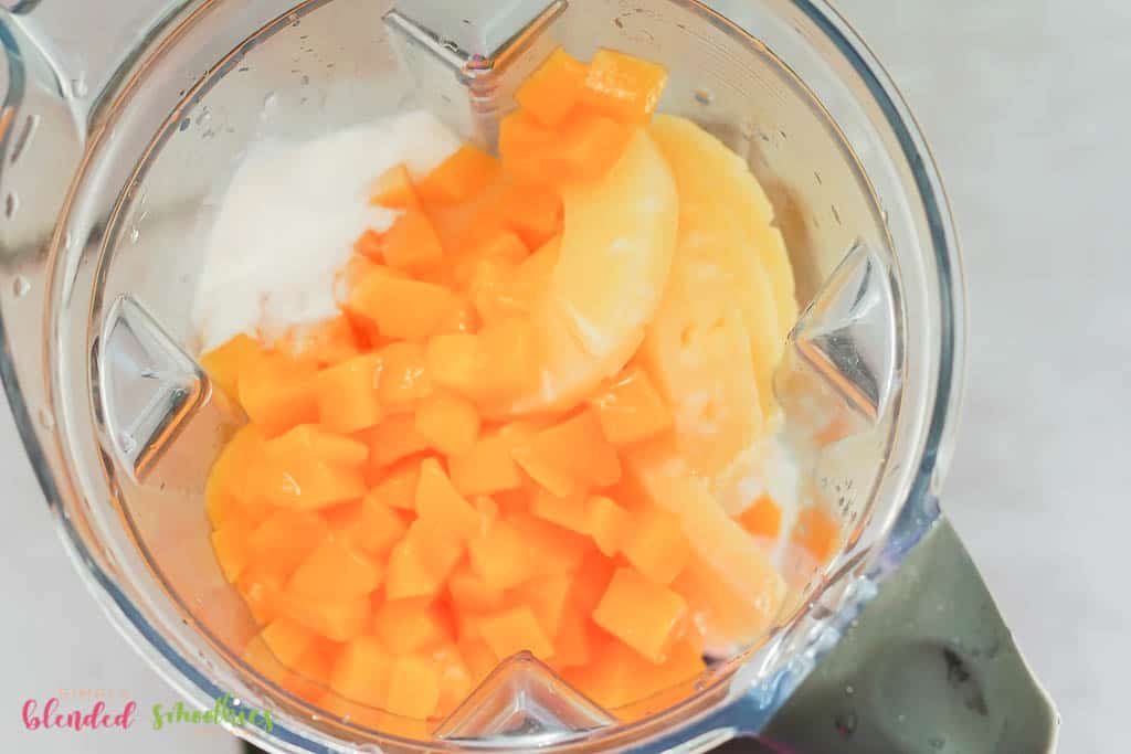 Mango Pineapple Milkshake 8 mangos pineapple ice cream in a blender looking from the top down