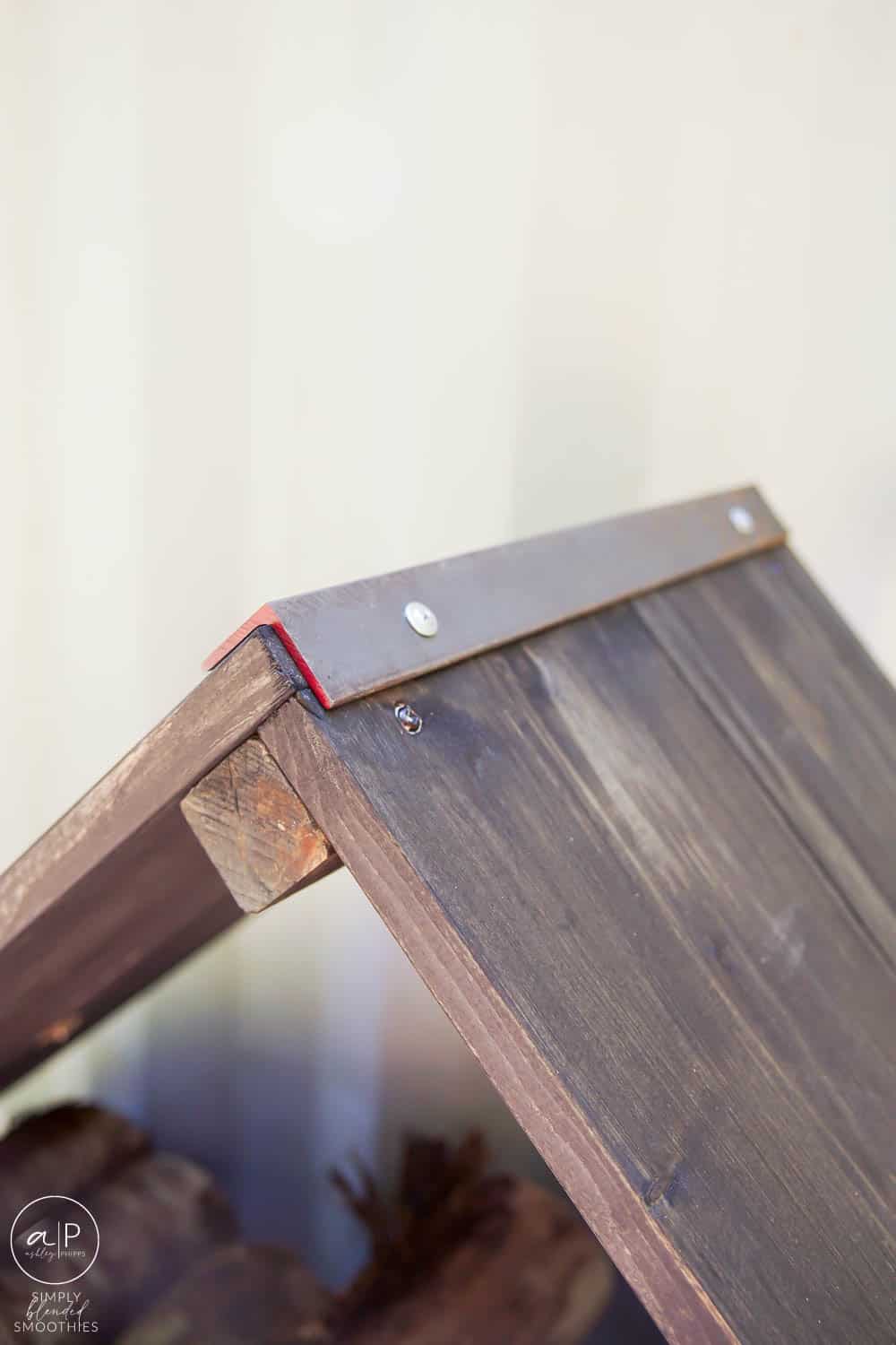 close up of corner on firewood rack with angle iron on corners