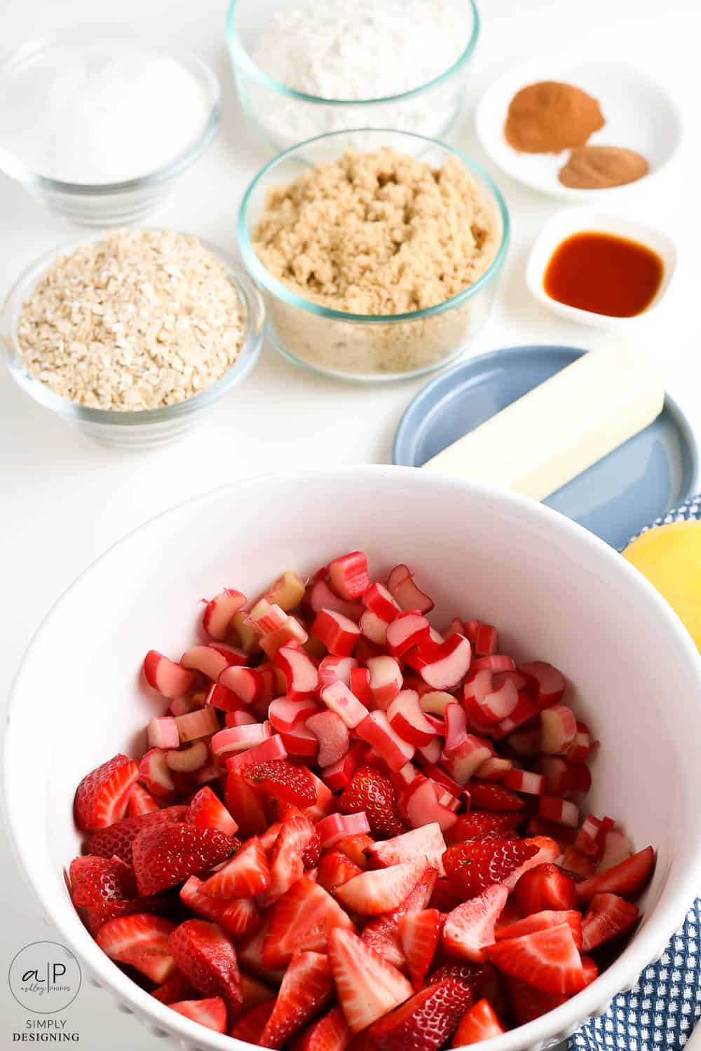 rhubarb and strawberries in a large white bowl