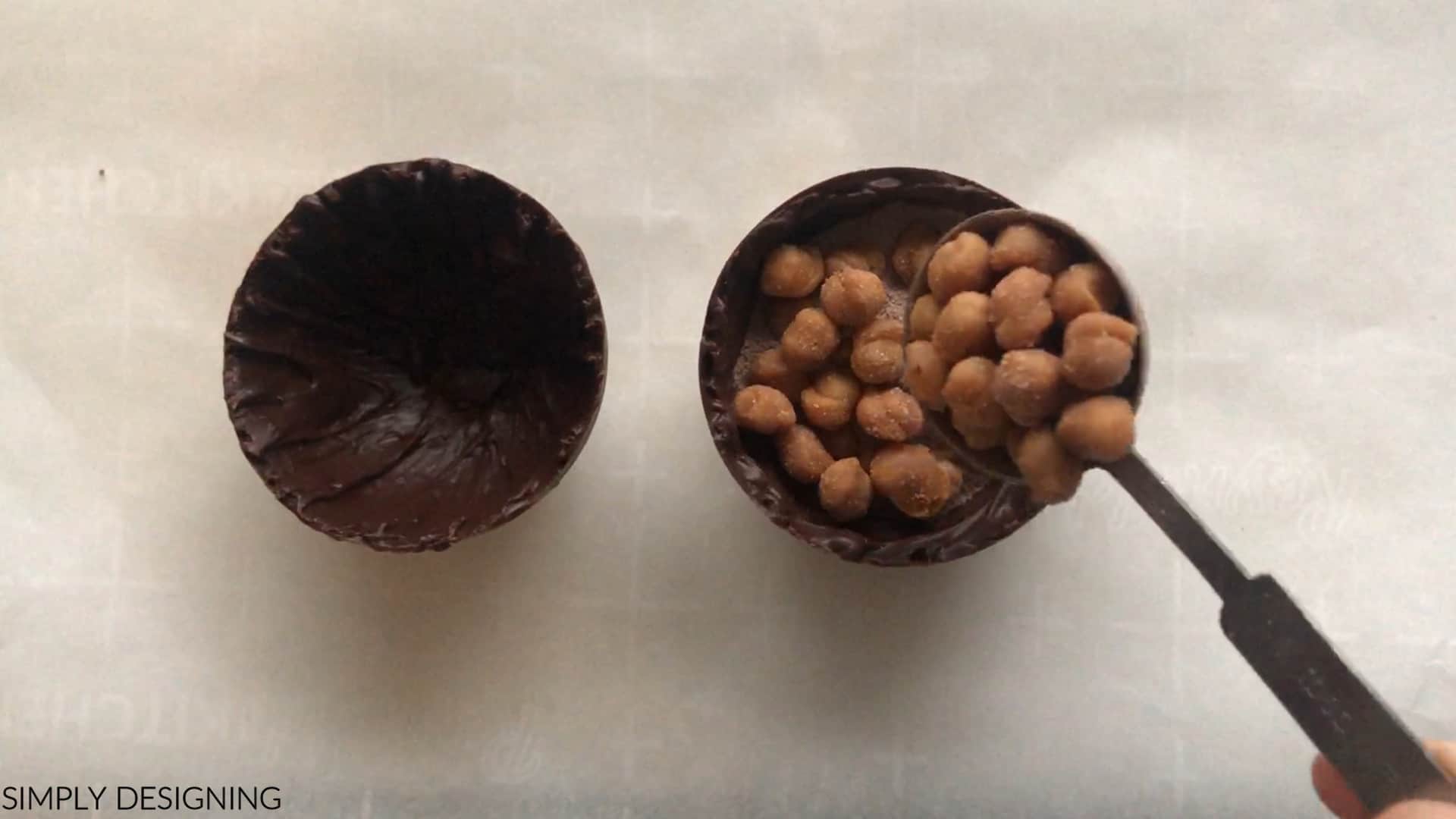 put caramel bits into hollow chocolate spheres for caramel hot chocolate bombs